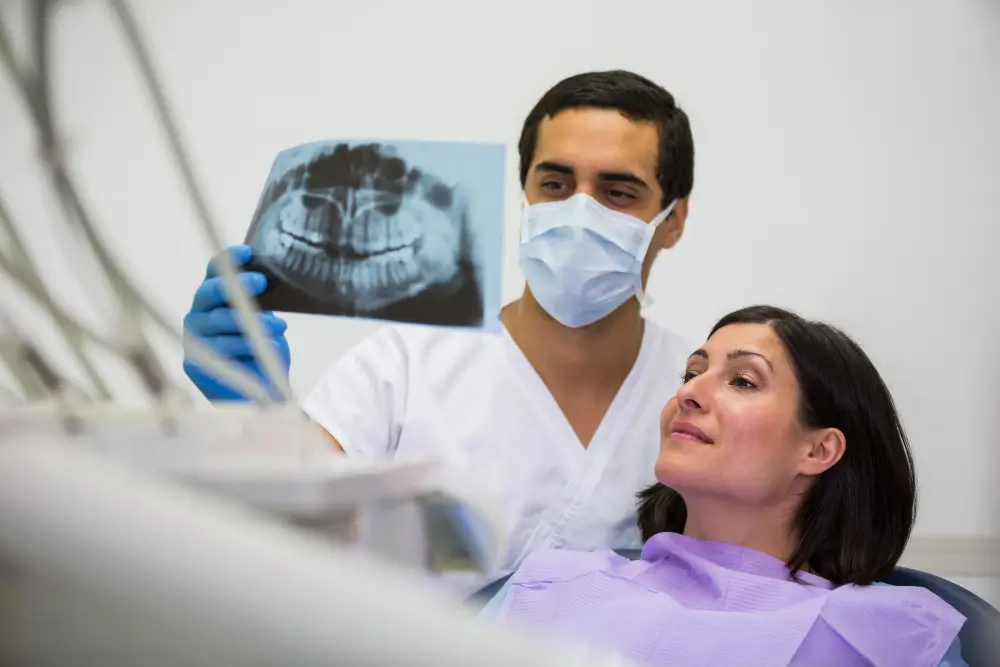 A humanitarian aid doctor providing care to a patient, highlighting the importance of building trust and safety.